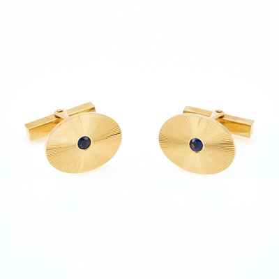 Lot 2095 - Tiffany & Co. Pair of Gold and Sapphire Cufflinks