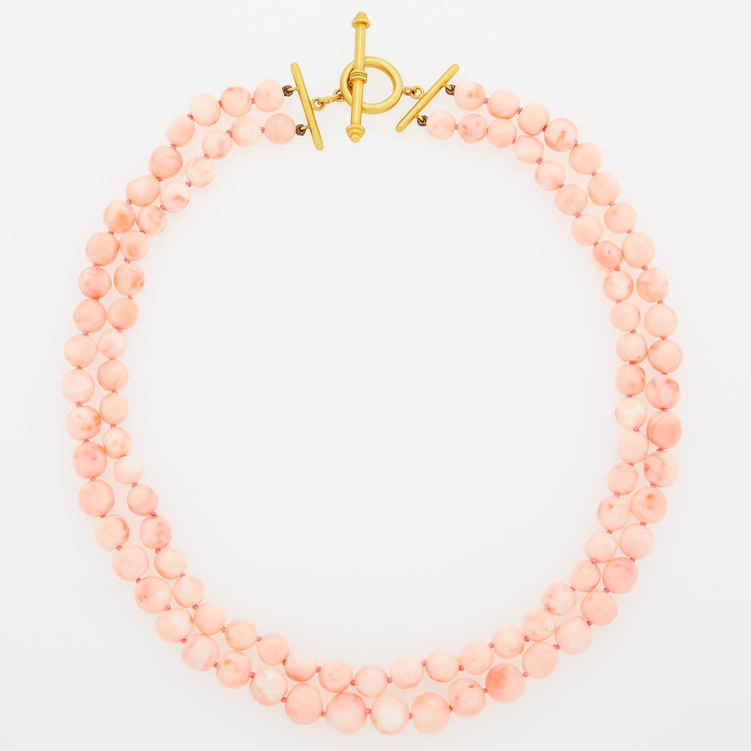 Lot 1116 - Double Strand Coral Bead Necklace with Gold Toggle Clasp