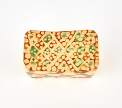 Lot 307 - A Chinese Small Sancai Glazed Earthenware Pillow