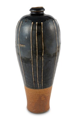 Lot 311 - A Chinese Cizhou Black Glazed Ribbed Vase