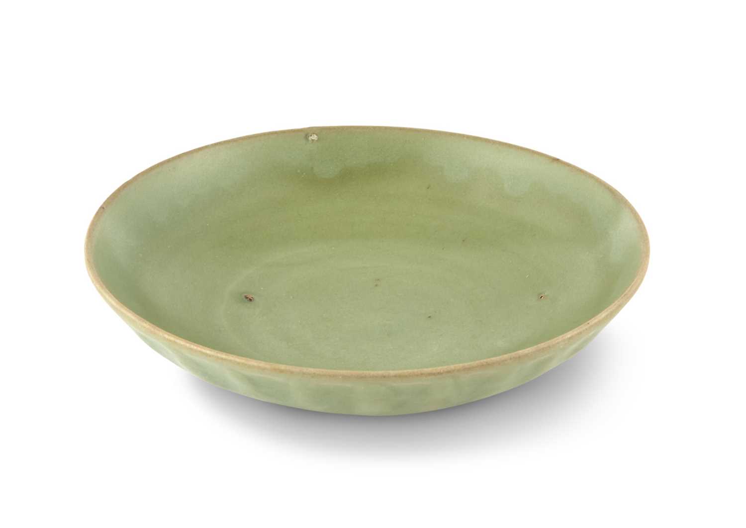 Lot 310 - A Chinese Longquan Petal Carved Celadon Dish