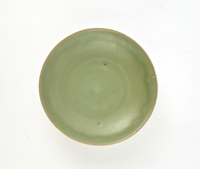 Lot 310 - A Chinese Longquan Petal Carved Celadon Dish