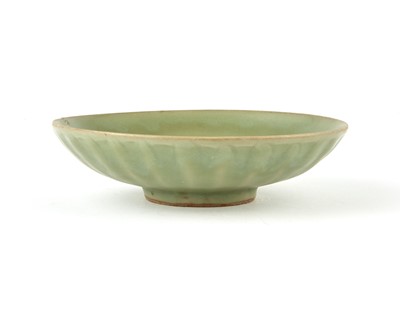Lot 310 - A Chinese Longquan Petal Carved Celadon Dish