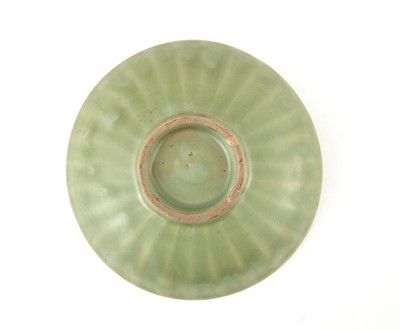 Lot 310 - A Chinese Longquan Petal Carved Celadon Dish