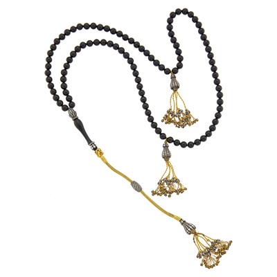 Lot 111 - Indian Antique Long Black Onyx Bead, High Karat Gold, Silver and Diamond Fringe Sautoir