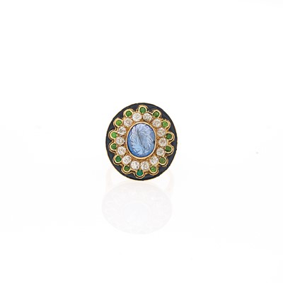 Lot 1093 - Gold, Carved Sapphire, Diamond and Demantoid Garnet and Black Enamel Ring