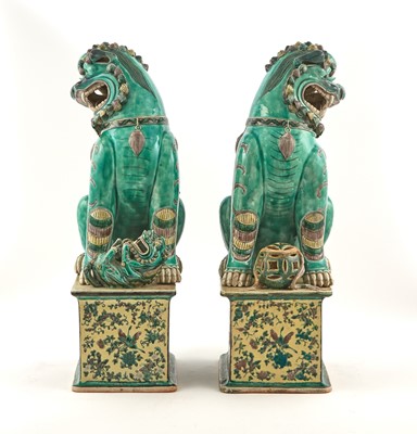 Lot 378 - A Pair of Chinese Famille Verte Porcelain Fu Dogs