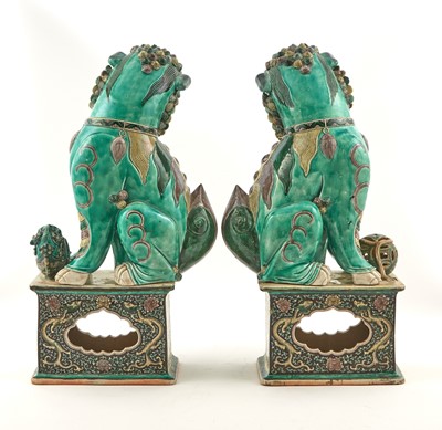 Lot 378 - A Pair of Chinese Famille Verte Porcelain Fu Dogs