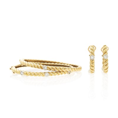 Lot 1003 - Pair of Two-Color Gold and Diamond Hoop Earclips and Two Bangle Bracelets