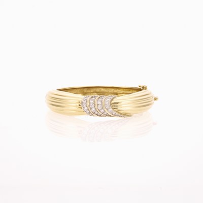 Lot 1011 - Gold and Diamond Bangle Bracelet