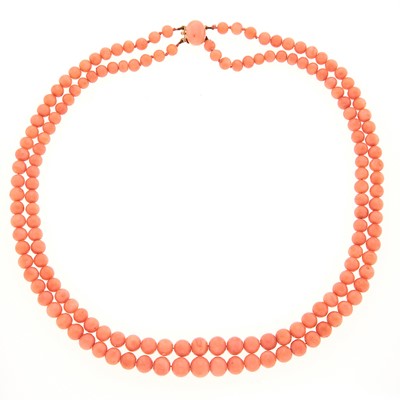 Lot 1218 - Double Strand Coral Bead Necklace with Gold and Coral Clasp