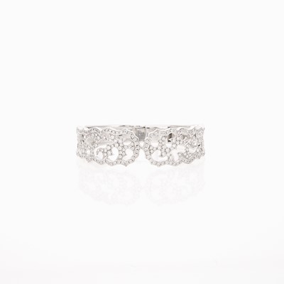 Lot 1051 - White Gold and Diamond Bangle Bracelet