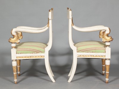 Lot 666 - Pair of Continental Empire Painted and Parcel-Gilt Armchairs