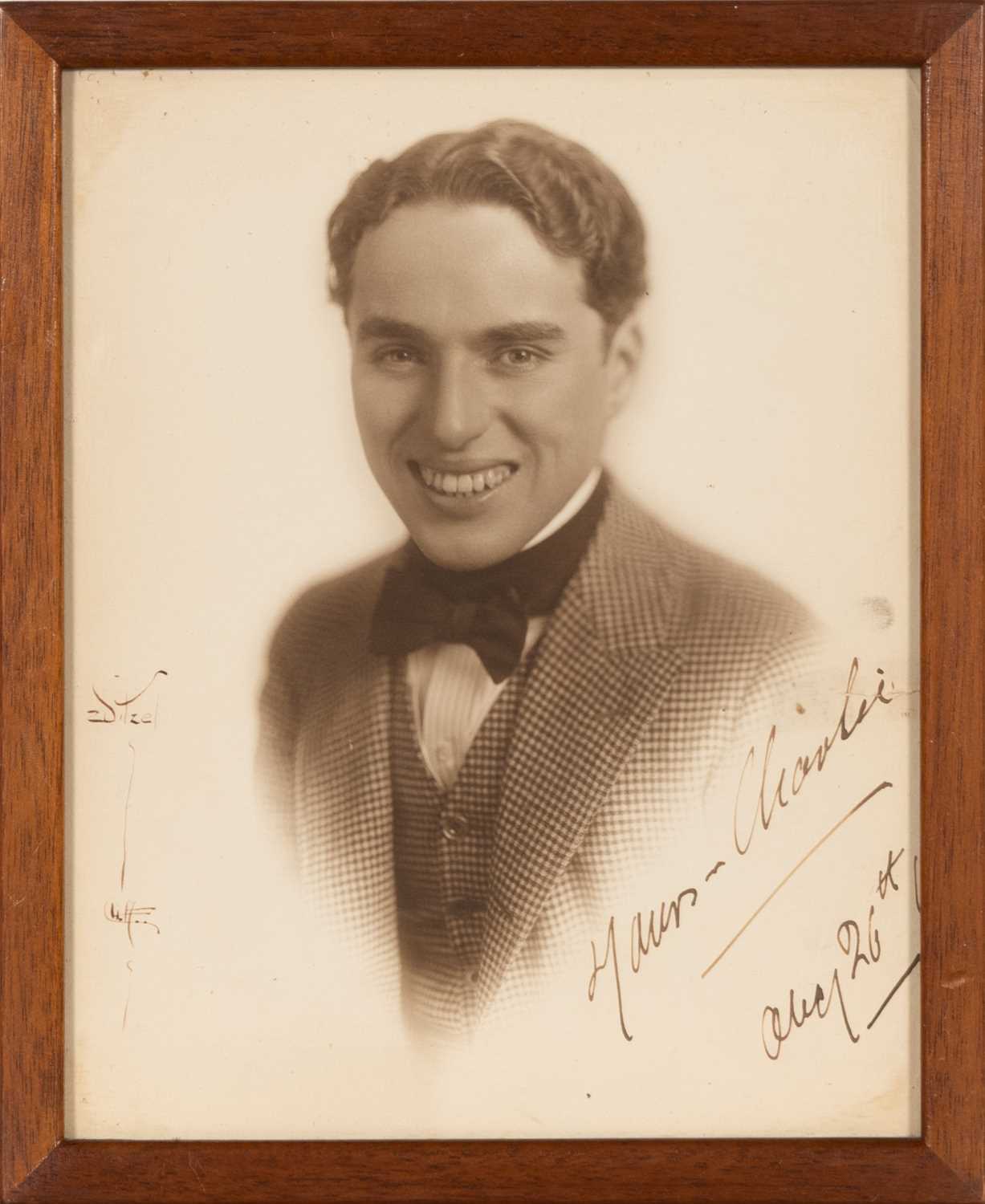 Lot 5051 - An early inscribed photograph of Charlie Chaplin