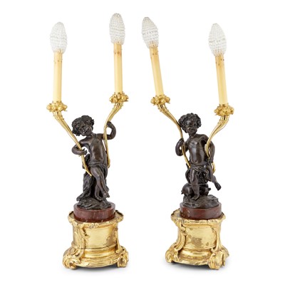 Lot 313 - Pair of Louis XV Style Gilt and Patinated Bronze and Rouge Marble Putto-Form Two-Light Lamps