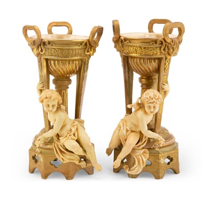 Lot 250 - Pair of Rudolstadt Works Gilt and Enameled Porcelain Figural Centerpieces