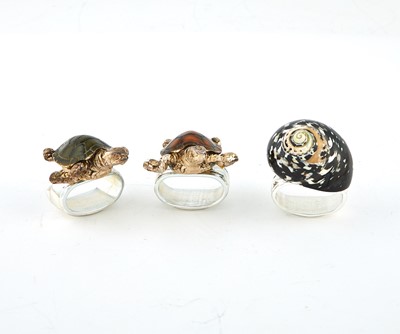 Lot 70 - Set of Eight Silver Plated Turtle Napkin Rings and Twelve Shell Examples