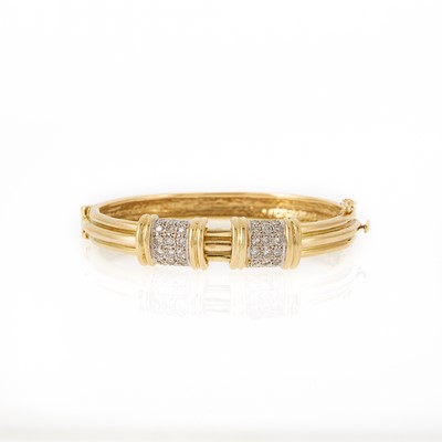 Lot 2246 - Two-Color Gold and Diamond Bangle Bracelet