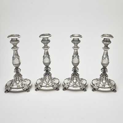 Lot 182 - Set of Four American Adams Style Sterling Silver Candlesticks