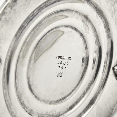 Lot 182 - Set of Four American Adams Style Sterling Silver Candlesticks