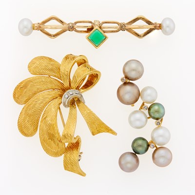 Lot 2247 - Cartier Two-Color Gold and Diamond Ribbon Brooch, Gem-Set Bar Brooch and Cultured Pearl Enhancer