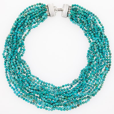 Lot 2289 - Tiffany & Co. Thirteen Strand Turquoise Bead Necklace with Silver Clasp