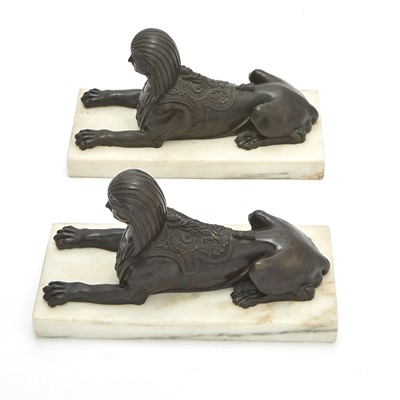 Lot 701 - Pair of Empire Style Patinated Bronze Sphinxes on Marble Plinths