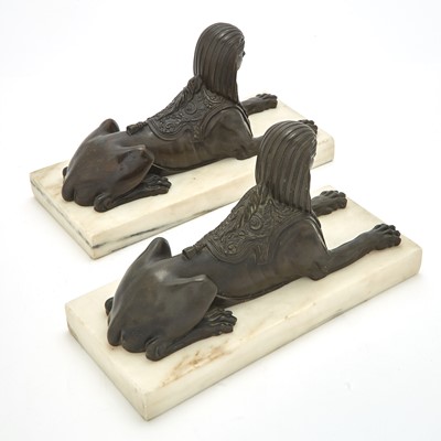 Lot 701 - Pair of Empire Style Patinated Bronze Sphinxes on Marble Plinths