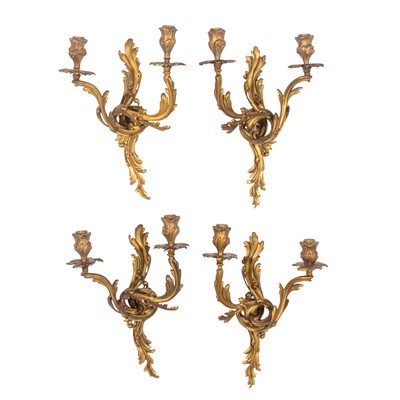 Lot 341 - Set of Four Louis XV Style Gilt-Metal Two-Light Wall Sconces