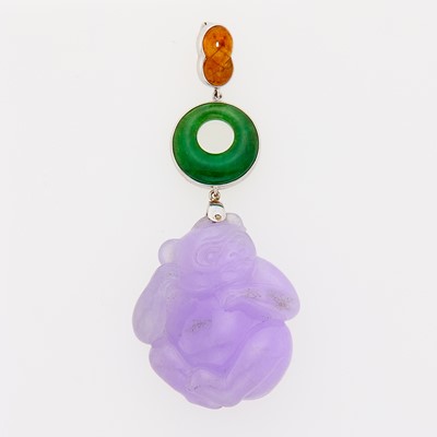 Lot 2218 - White Gold, Carved Lavender Jade, Jade and Orange Jade Bear Pendant