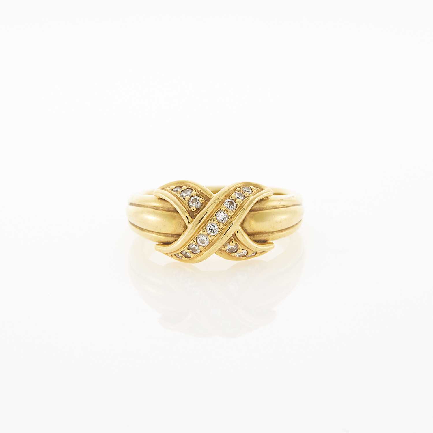 Lot 2087 - Tiffany & Co. Gold and Diamond 'X' Ring