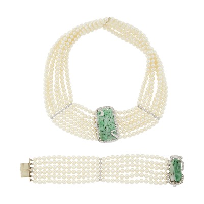 Lot 1068 - Multistrand Cultured Pearl, White Gold, Carved Jade and Diamond Necklace and Bracelet