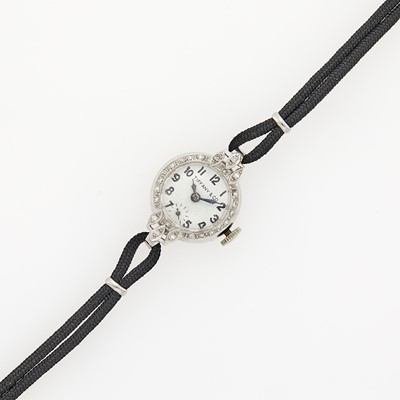 Lot 1156 - Tiffany & Co. Platinum and Diamond Wristwatch with Black Cord and Stainless Steel Bracelet