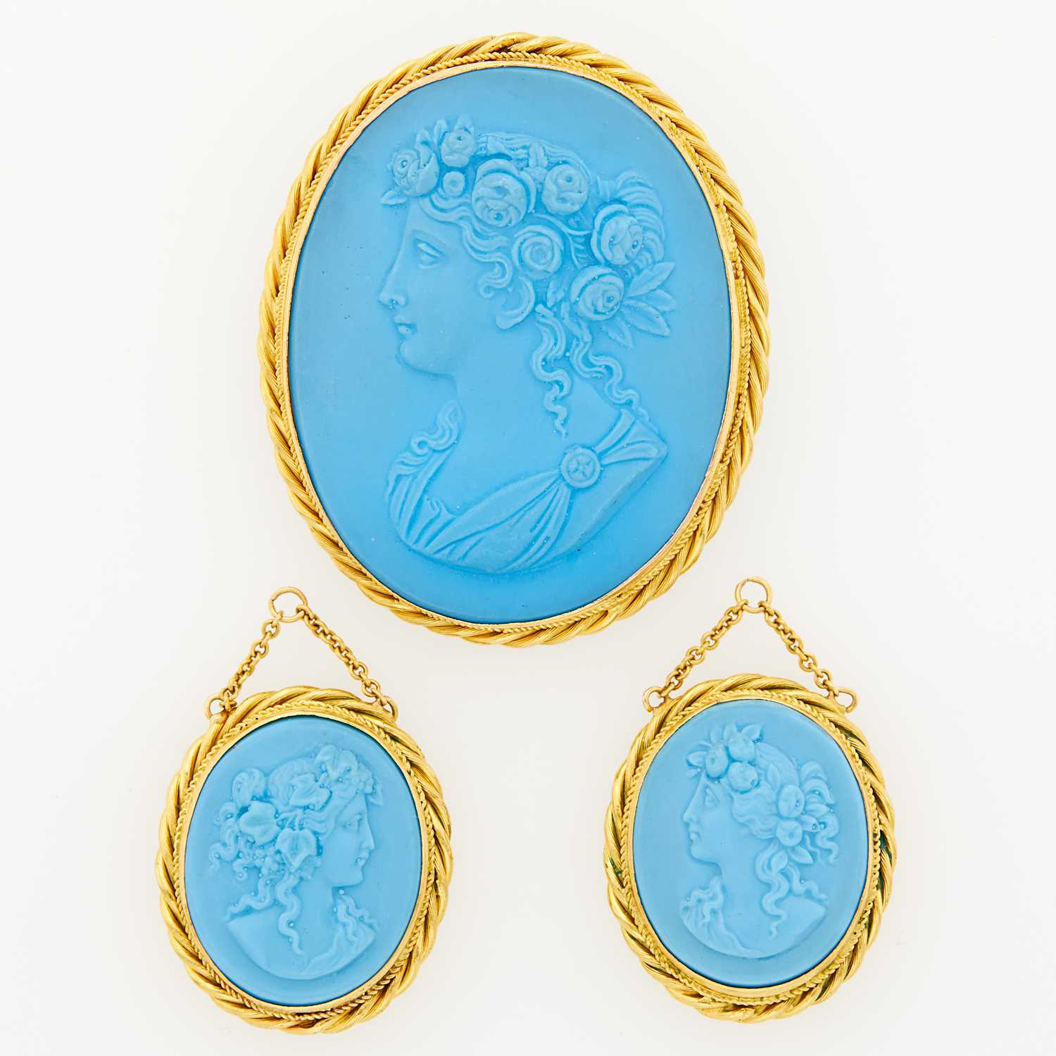 Lot 1137 - Gold and Blue Porcelain Cameo Brooch and Two Pendants