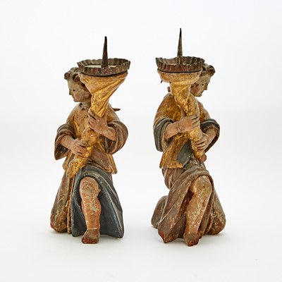 Lot 631 - Pair of Italian Polychromed and Parcel-Gilt Carved Wood Figural Candlesticks