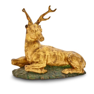 Lot 633 - Continental Painted and Parcel-Gilt Carved Wood Figure of a Recumbent Stag