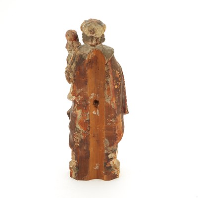 Lot 423 - Continental Polychromed and Parcel-Gilt Wood Figure of a Male Saint Holding a Young Girl