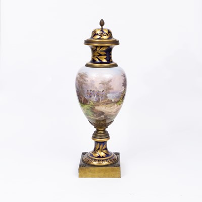 Lot 256 - Pair of Oversize Sèvres Style Napoleonic-Themed Gilt-Metal Mounted Porcelain Urns and Covers