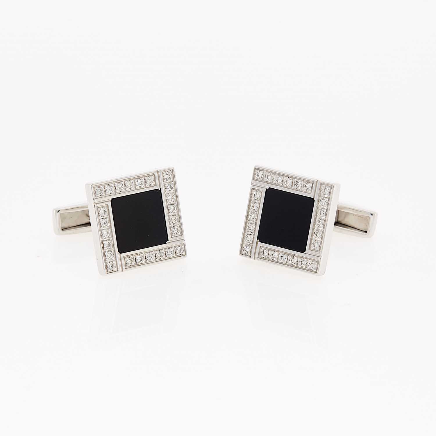 Lot 1105 - Bulgari Pair of White Gold, Black Onyx and Diamond Cufflinks