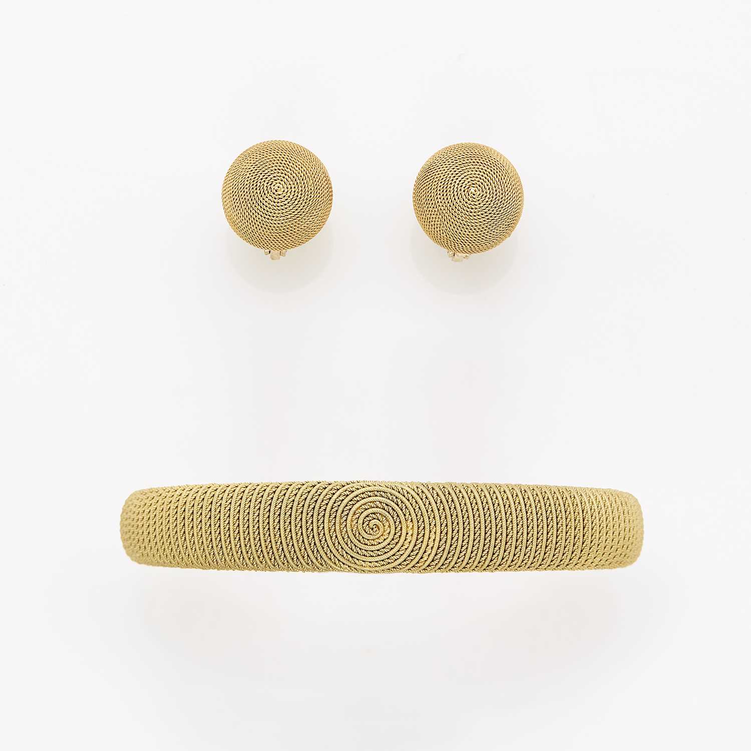 Lot 1122 - Gold Bangle Bracelet and Pair of Earrings