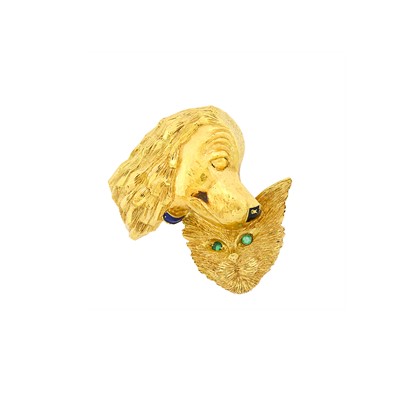 Lot 170 - Cartier Gold, Black Enamel and Emerald Cat and Dog Clip-Brooch, France
