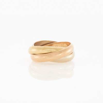 Lot 2084 - Cartier Tricolor Gold 'Trinity' Rolling Band Ring
