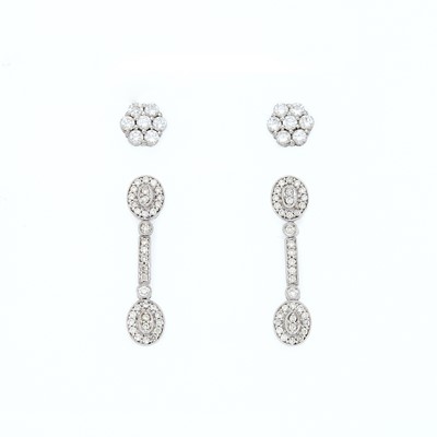 Lot 2193 - Pair of White Gold and Diamond Pendant-Earrings and Pair of Floret Earrings