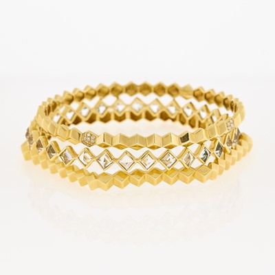 Lot 1034 - Three Gold, White Sapphire and Diamond Geometric Bangle Bracelets