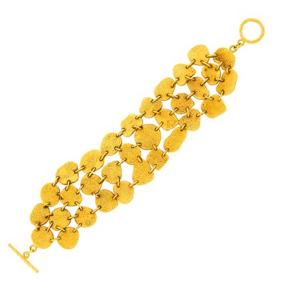 Lot 26 - Triple Strand Gold Toggle Bracelet