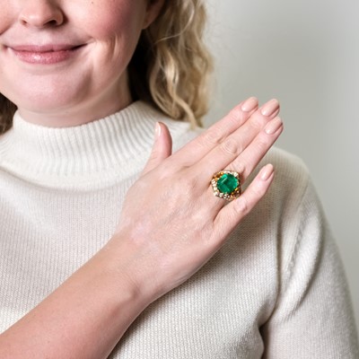 Lot 1199 - Gold, Emerald, Orange Sapphire and Diamond Ring