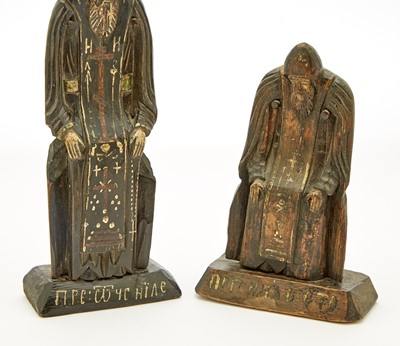 Lot 620 - Two Russian Carved and Painted Wood Figures of St. Nilus Stolobensky