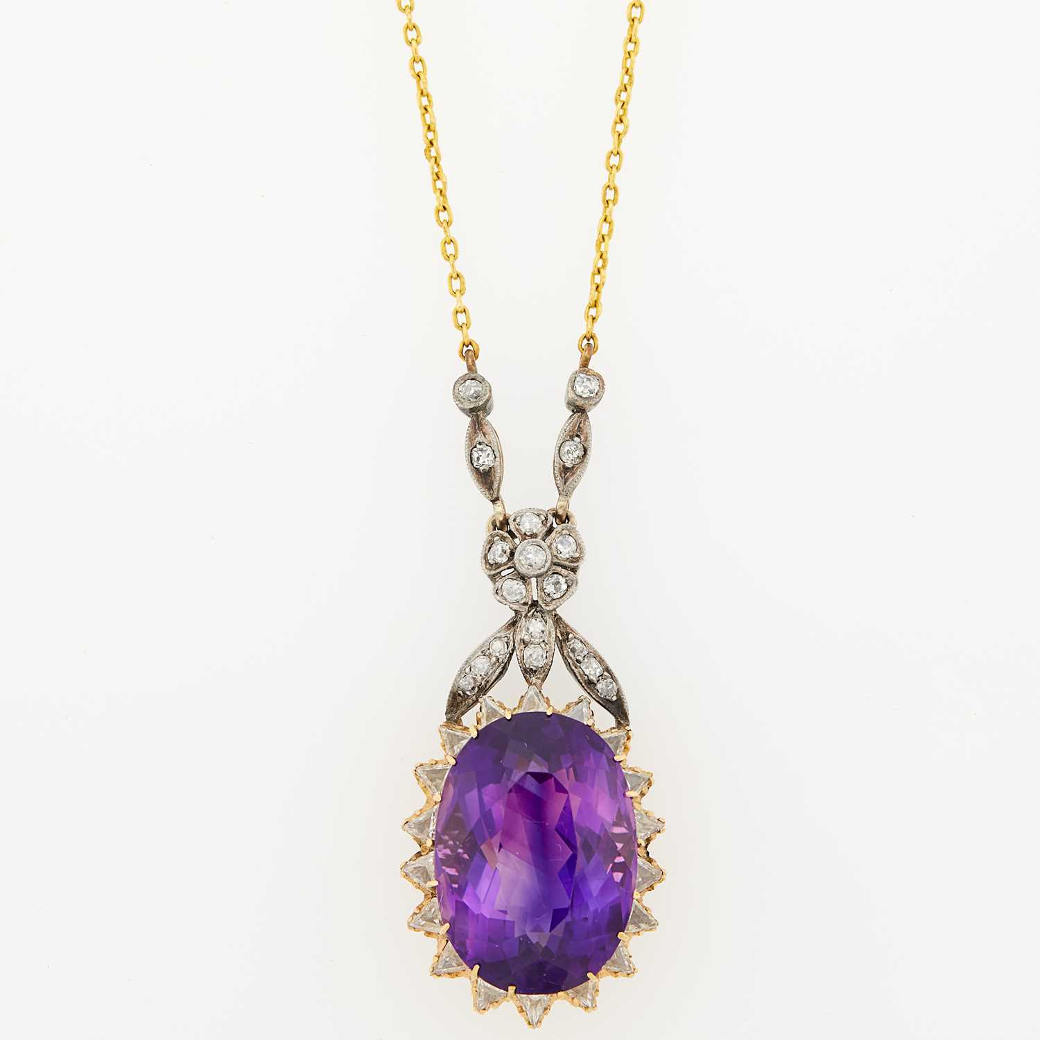 Lot 1141 - Gold, Silver, Amethyst and Diamond Pendant