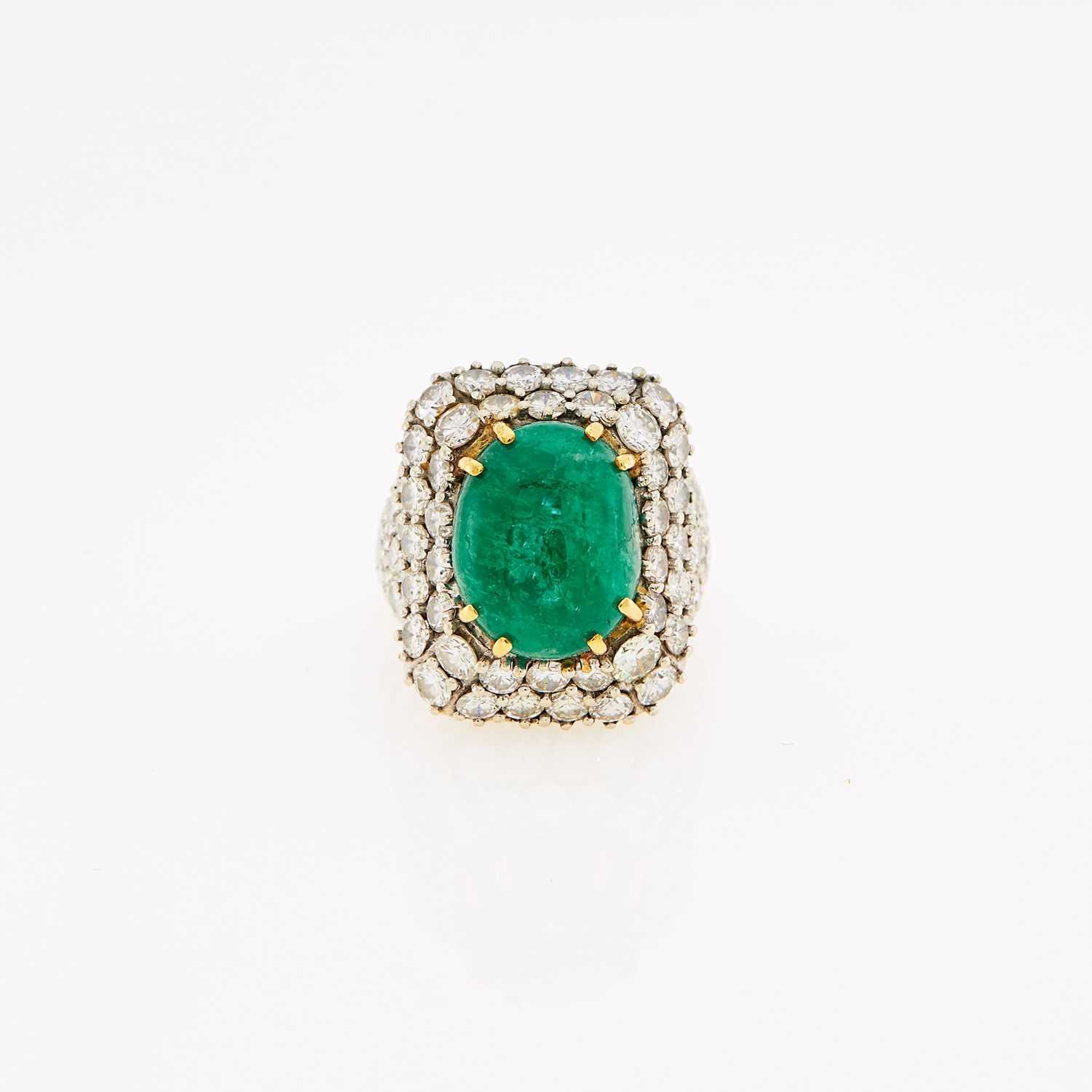 Lot 1068 - Palladium, Cabochon Emerald and Diamond Ring