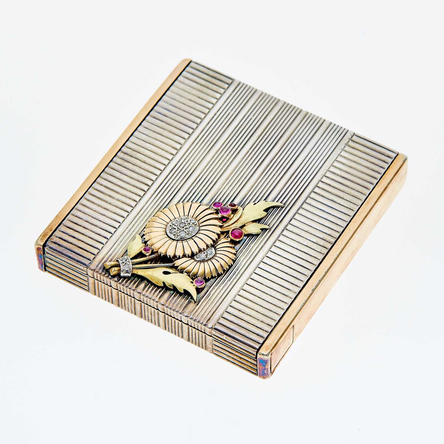 Lot 1097 - Mauboussin Silver, Two-Color Gold, Cabochon Ruby and Diamond Compact